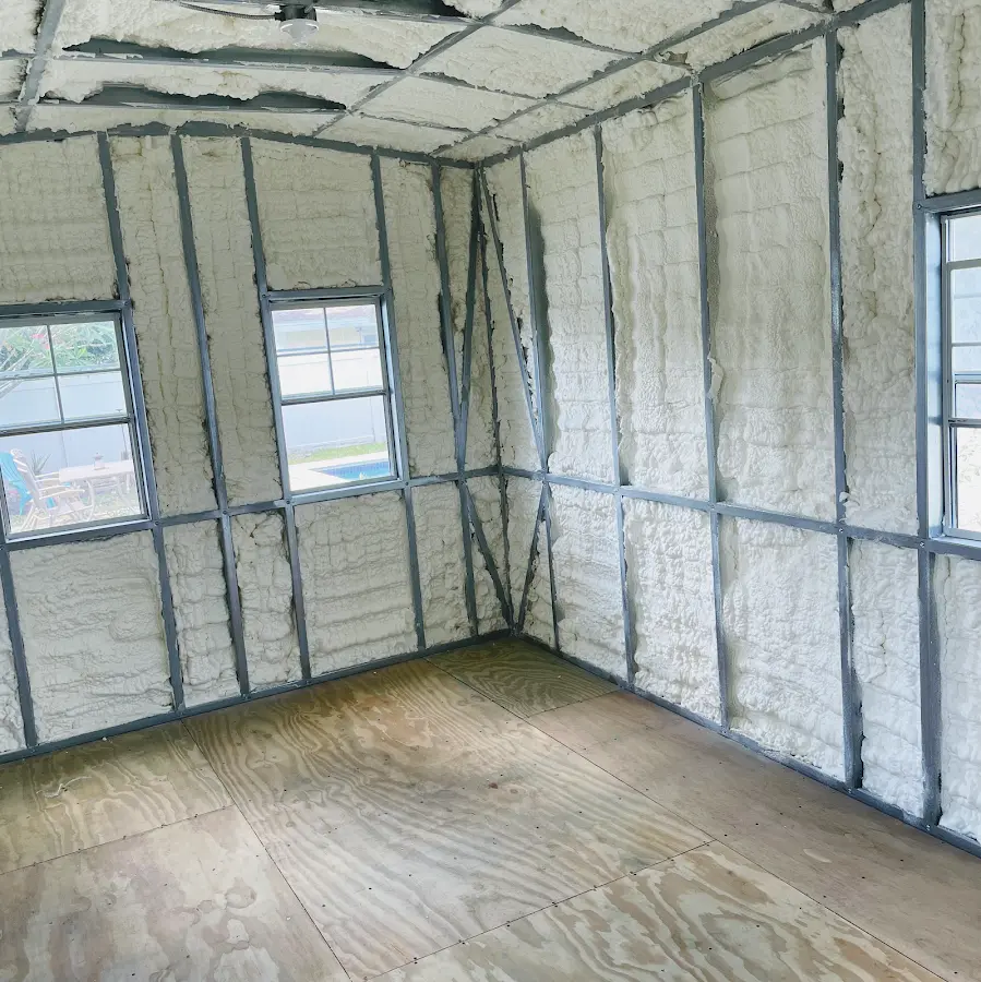 Closed-cell spray foam insulation applied to wall cavities in a residential project in Bloomington